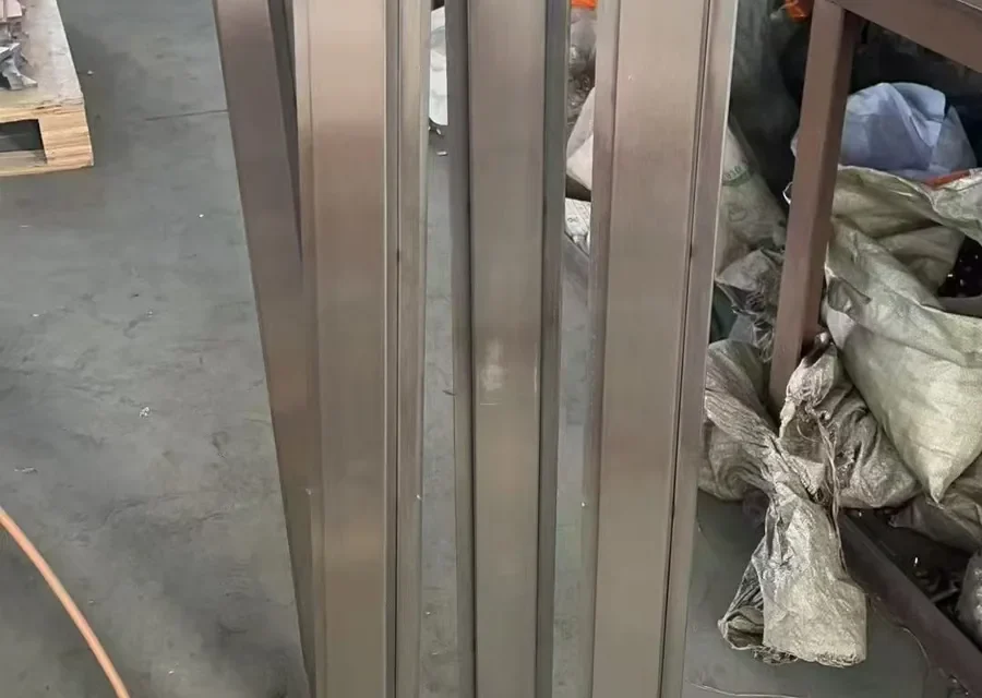 Square stainless steel railing posts with adjustable handrail support saddles